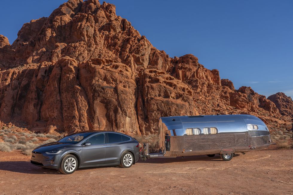 Tesla Model X towing a caravan
