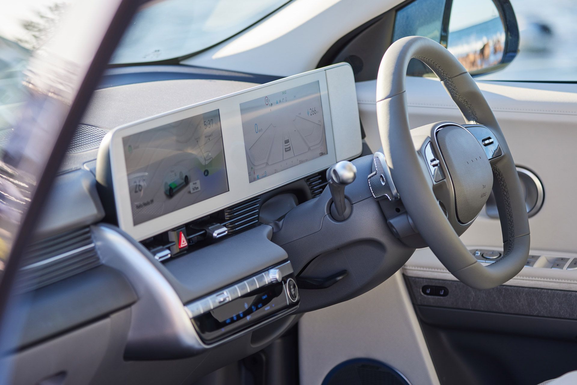 Hyundai Ioniq 5 interior white touchscreen and steering wheel
