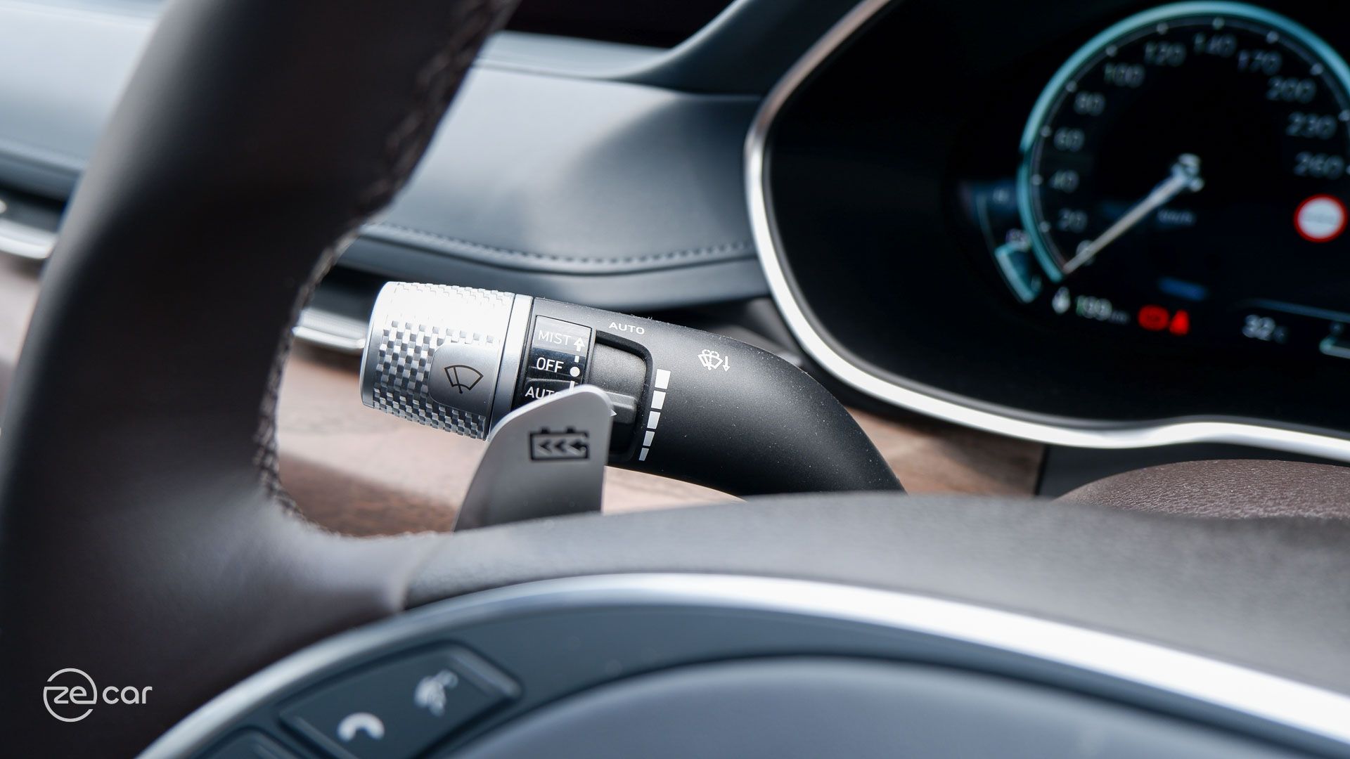 Genesis Electrified G80 paddle shifter and exterior side view