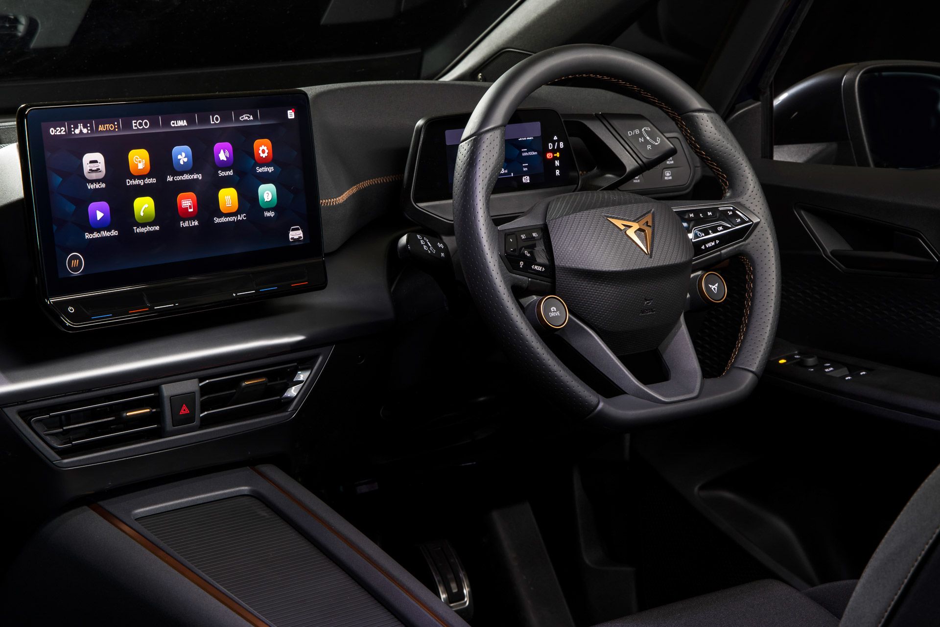 Cupra Born interior steering wheel and touchscreen