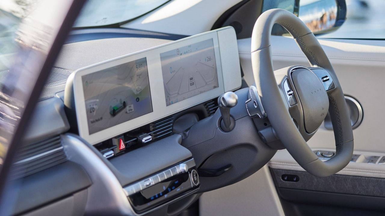 Hyundai Ioniq 5 white interior touchscreen and steering wheel