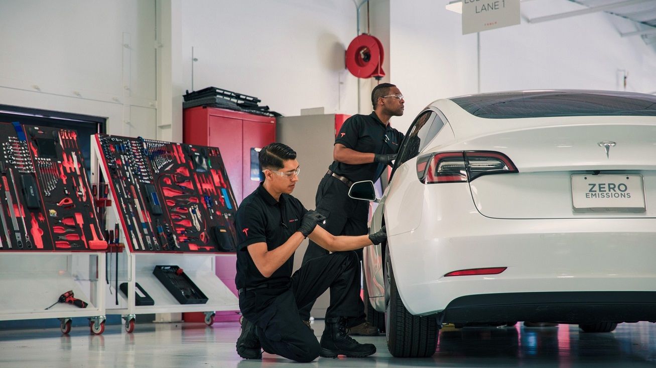 Tesla Model 3 being serviced in workshop