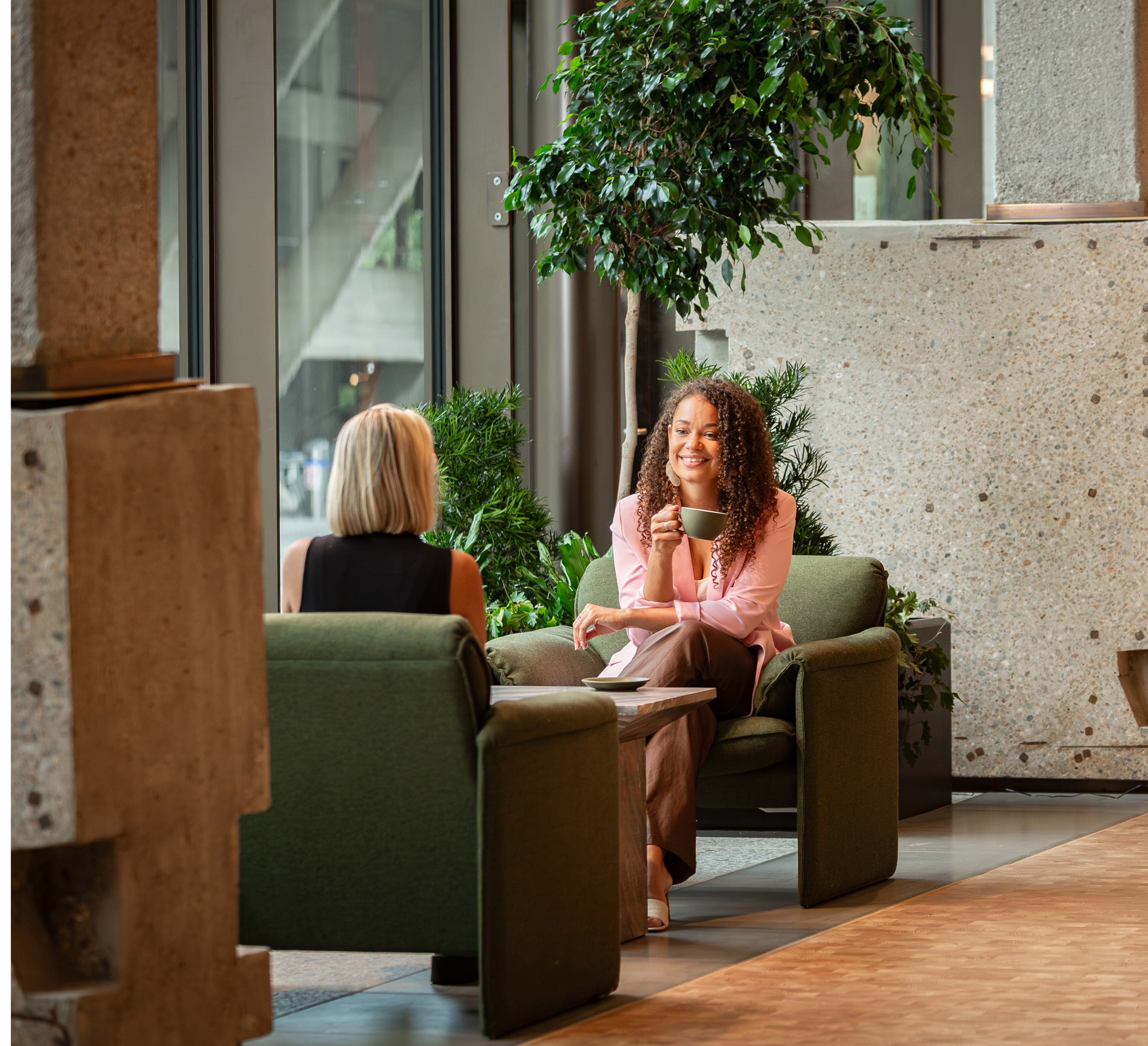 People in the reception space at 76 Southbank