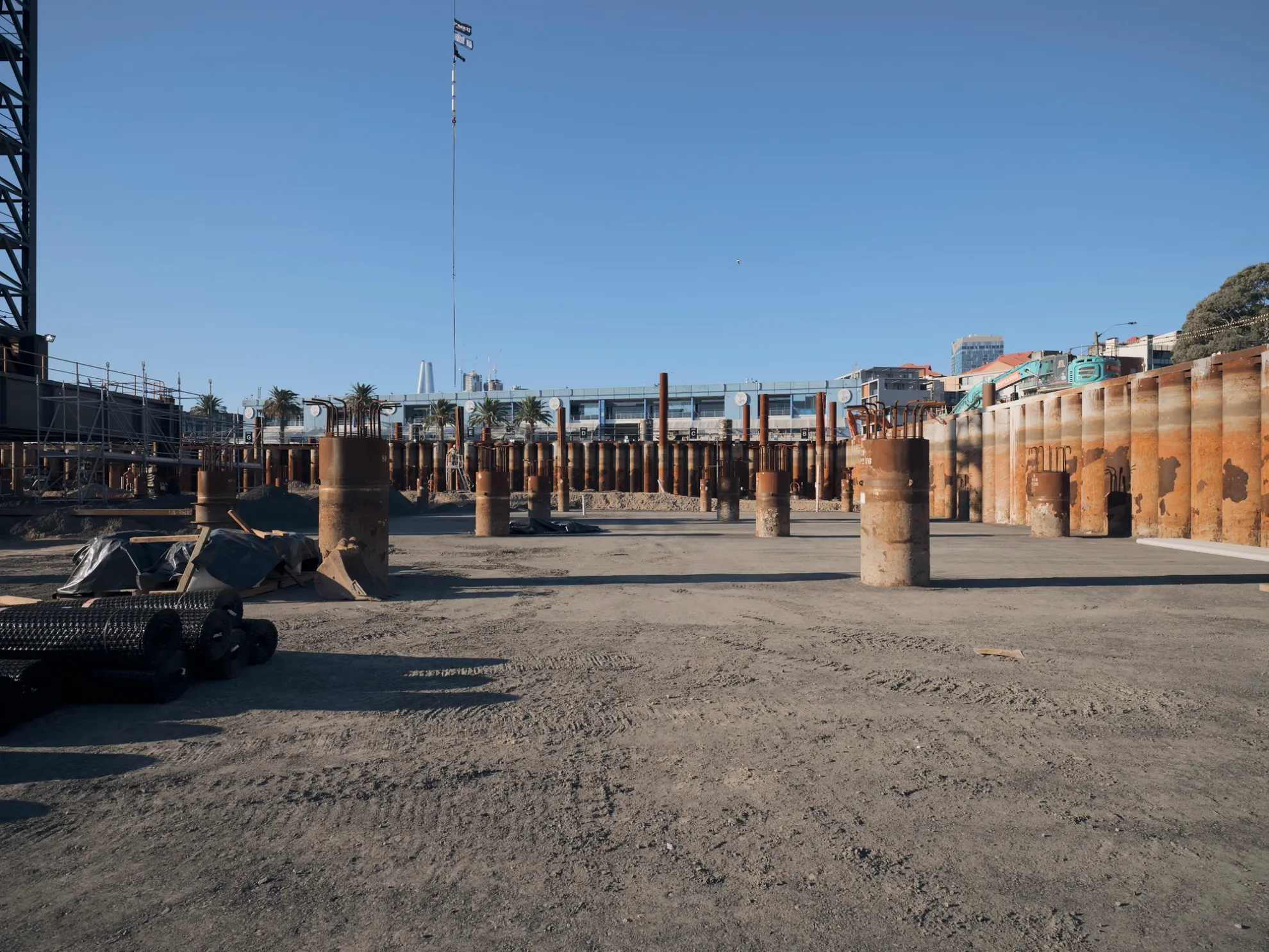 BVN Architecture — BVN Architecture Sydney construction progress — steel piling foundation works, waterfront public architecture project