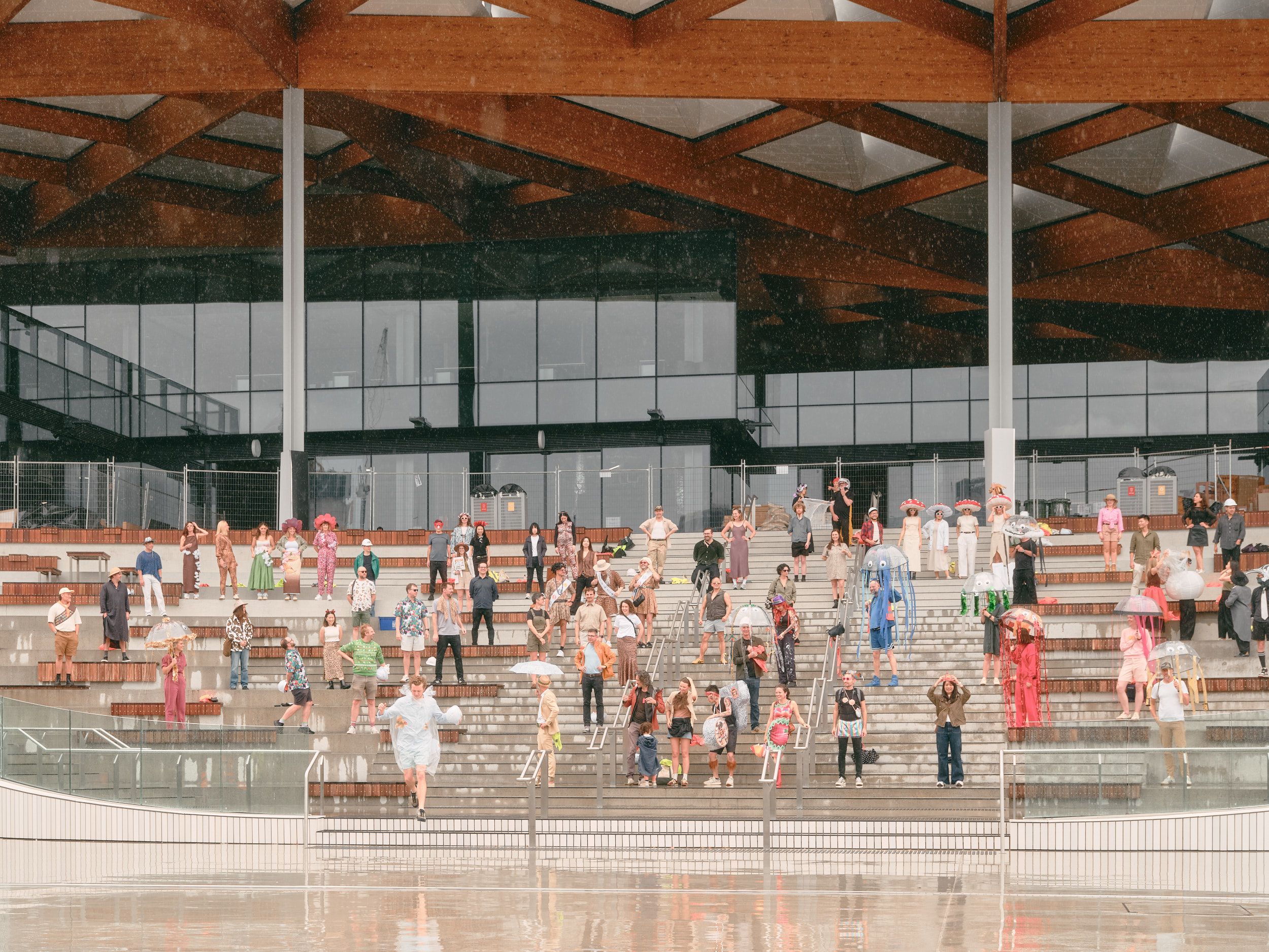 BVN Sydney Studio celebrates on the steps of the Sydney Fish Markets