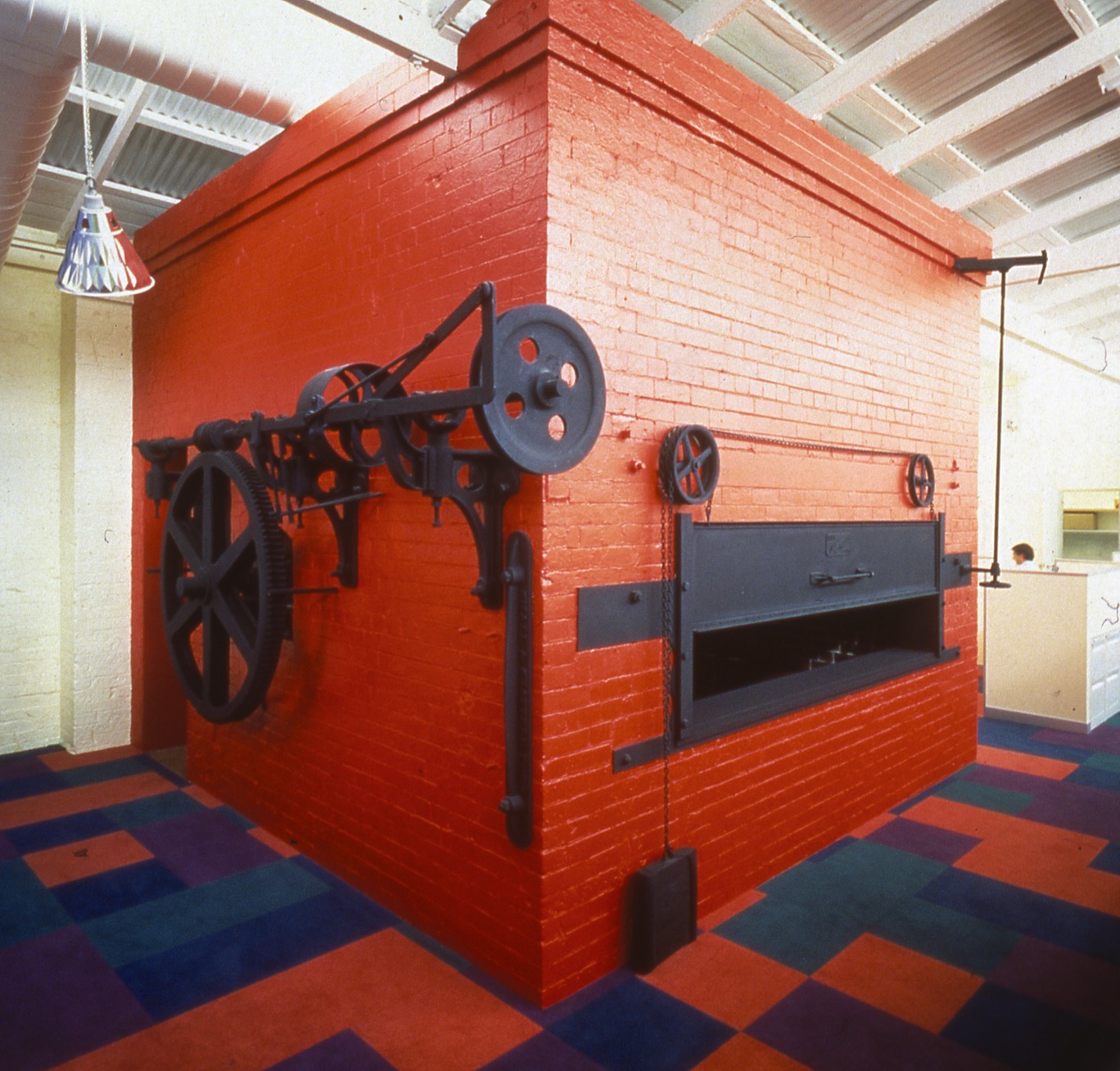 the original cylindrical brick oven has been preserved and converted into a unique meeting space.