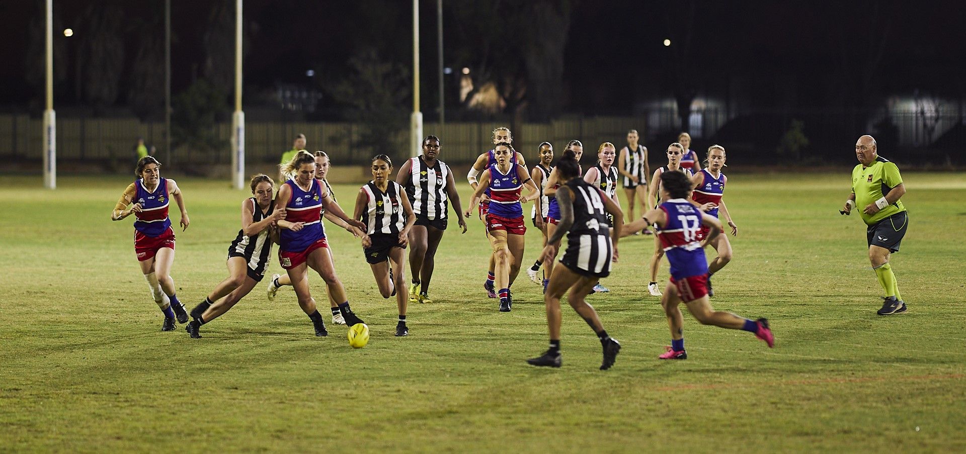 Girls playing football