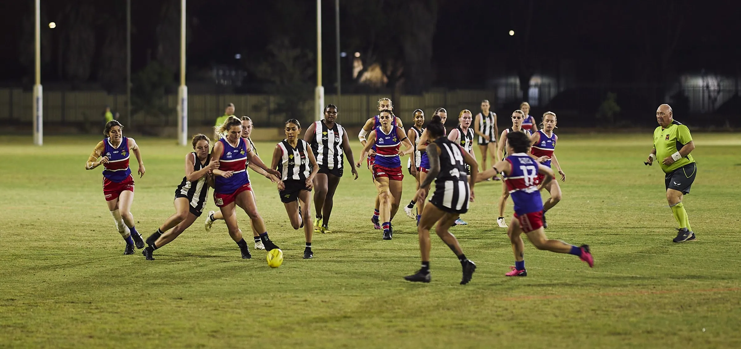 Girls playing football
