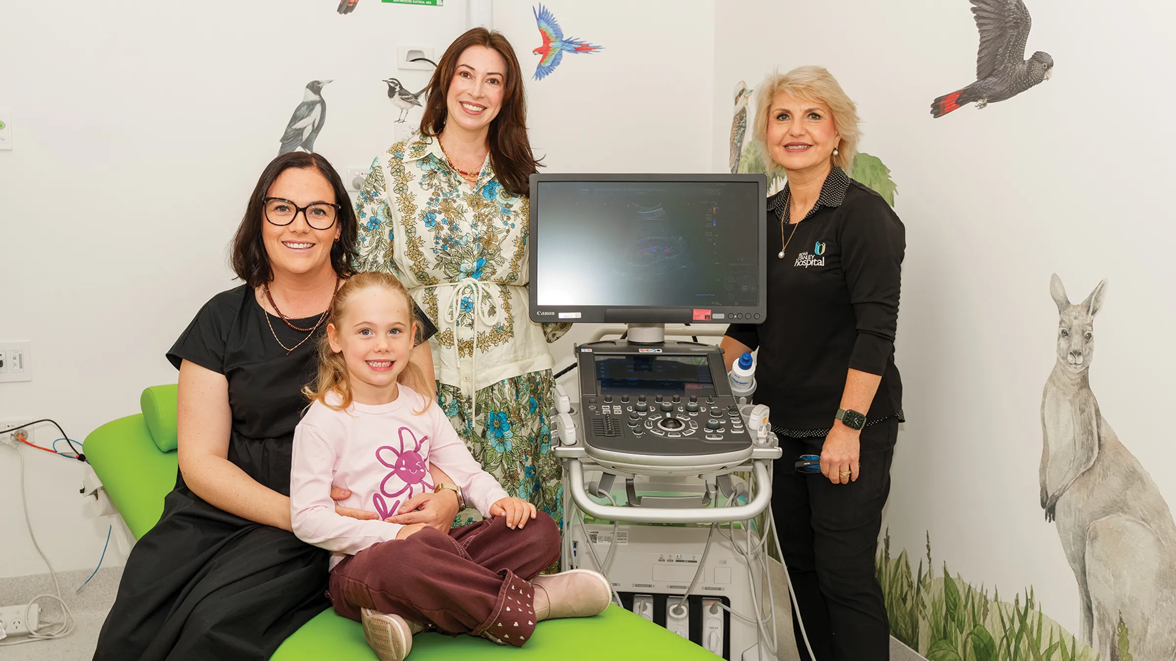 Isla Wagstaff and mum Ashleigh Evans, with MinRes Director People Andrea Chapman and Lead Sonographer Marilyn Zelesco at Fiona Stanley Hospital's new paediatric ultrasound suite