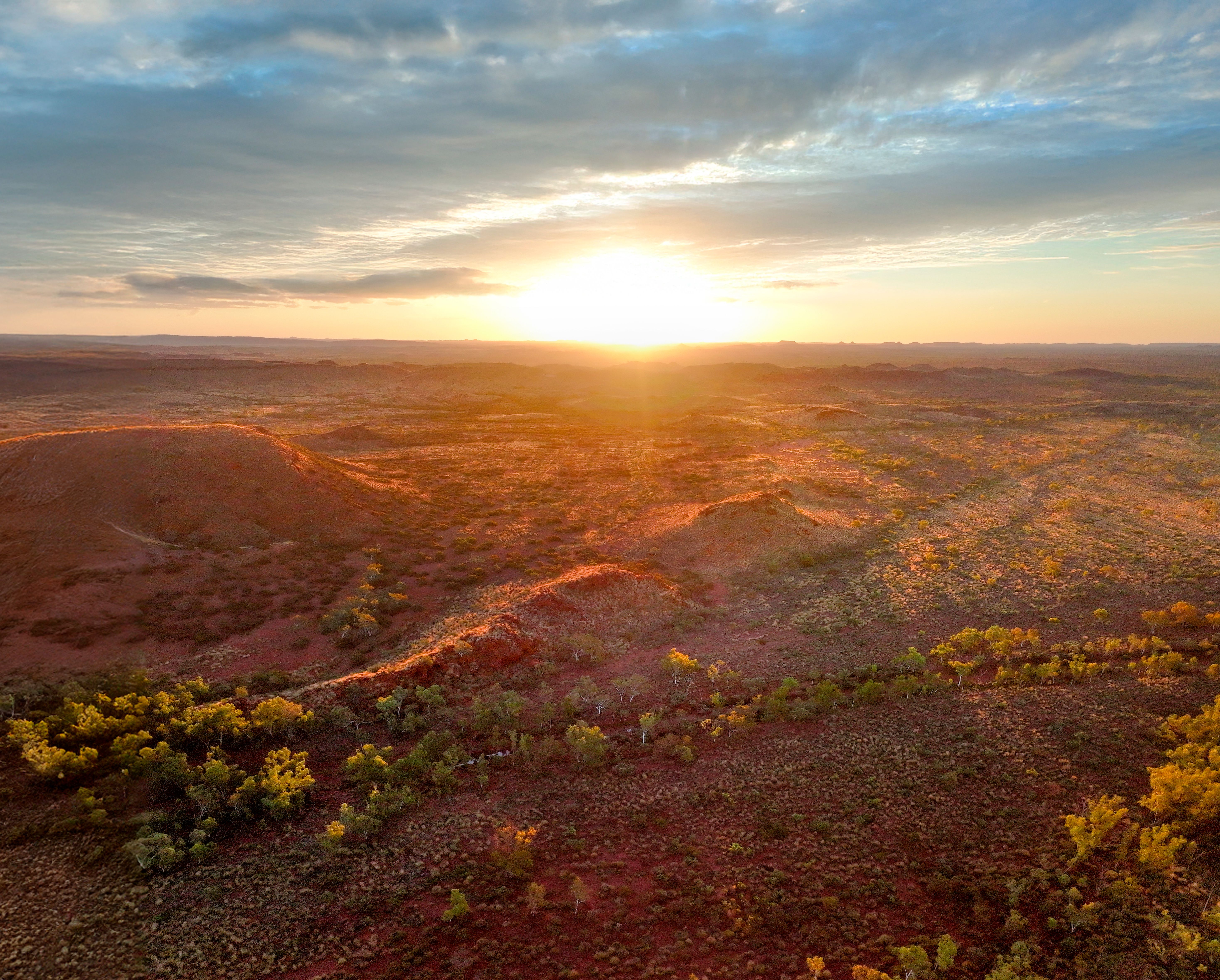 Sunset over red hills