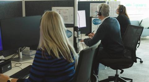 People sitting in a call center