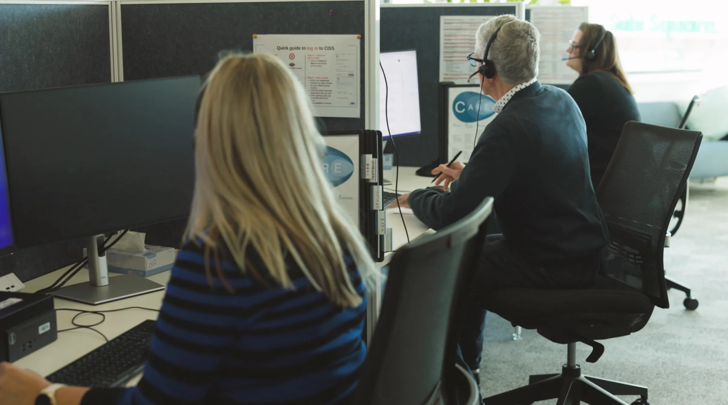People sitting in a call center