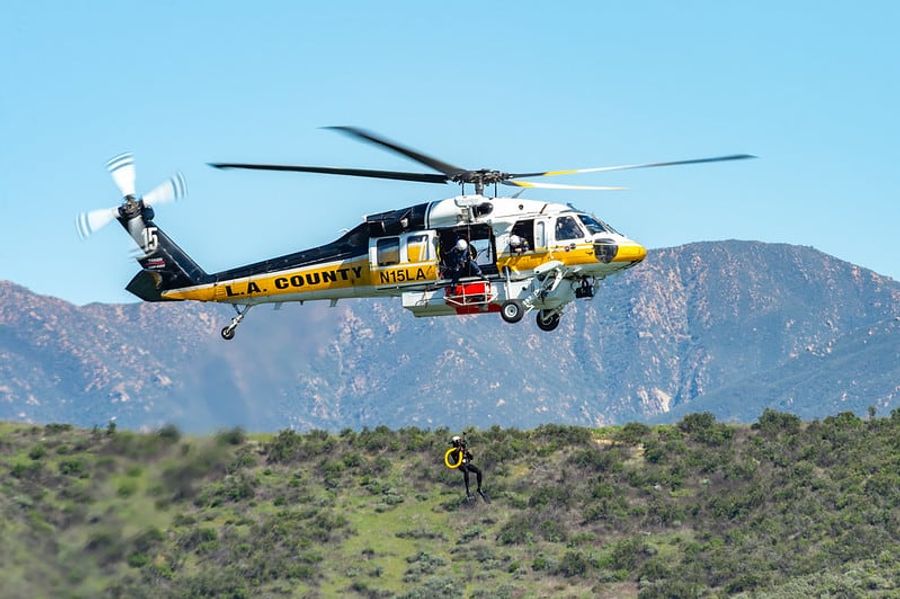 L.A. County helicopter with firefighter.