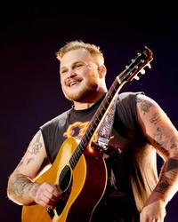 Zach Bryan performing in London in 2026