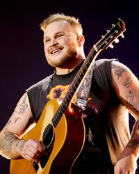Zach Bryan performing in London in 2026