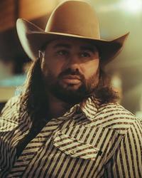 Koe Wetzel wearing a cowboy hat