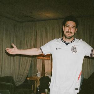 Marcus Mumford in an England FC strip