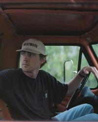 Dylan Gossett driving his truck