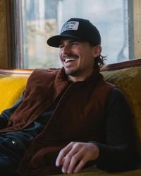 Tucker Wetmore sat down smiling