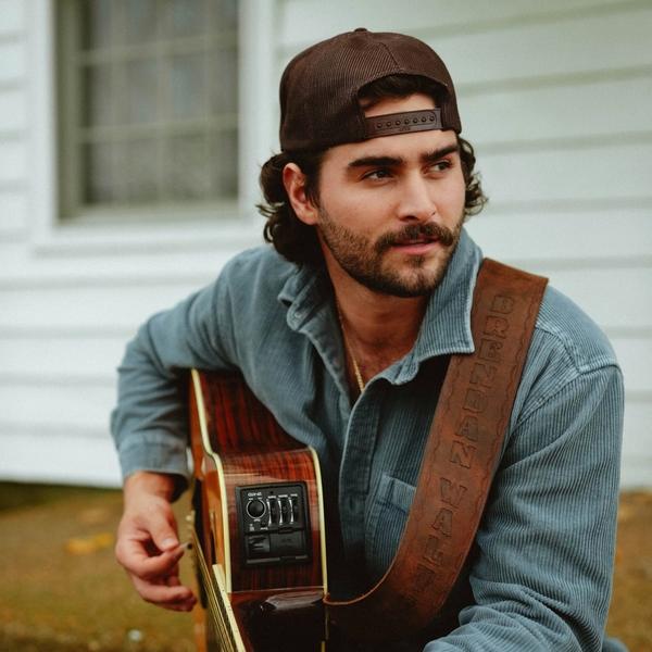 Brendan Walter wearing a backwards hat