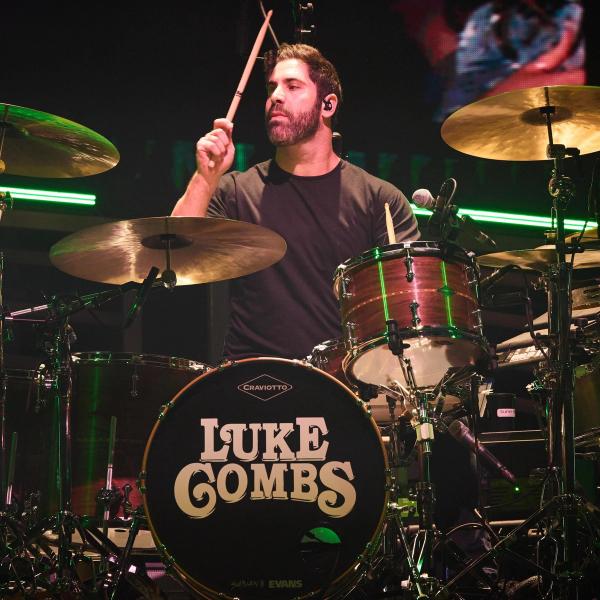 Jake Sommers playing drums for Luke Combs