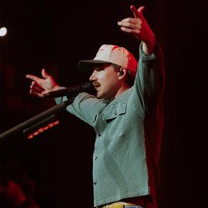 Morgan Wallen holding his hands in the air during his 2026 show at Nashville's The Pinnacle