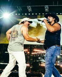 Gavin Adcock performing with Morgan Wallen