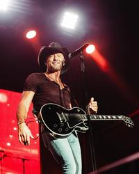 Tim McGraw performing on-stage