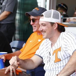 Morgan and Peyton watching a baseball game