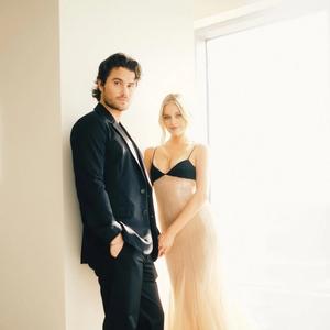 Kelsea Ballerini and Chase Stokes backstage for an awards show