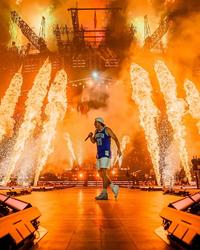 Morgan Wallen performing in Minneapolis with flames 