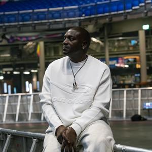 Akon backstage at an arena concert