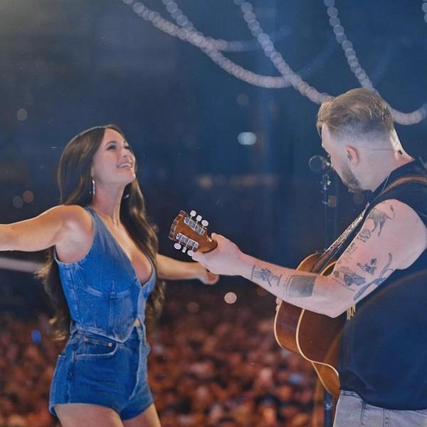 Zach Bryan and Kacey Musgraves performing together