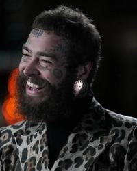 Post Malone in a leopard print suit