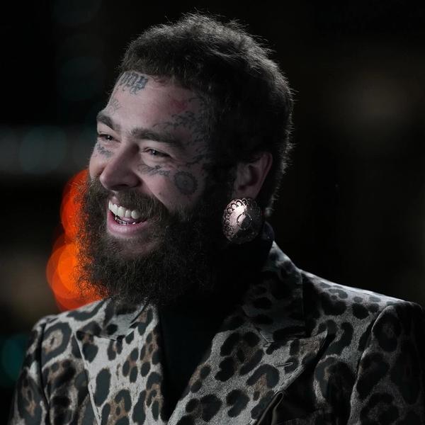 Post Malone in a leopard print suit