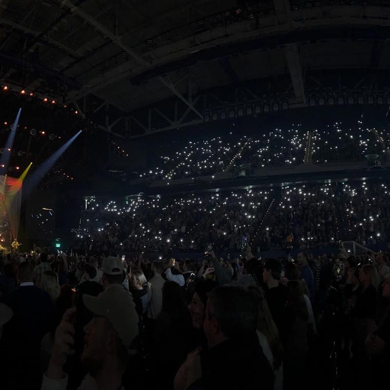 <p>A photograph of the stage and crowd at Tyler Childers' New Years Eve Shows at Rupp Arena in Lexington, Kentucky.</p>