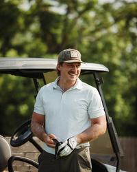 Morgan Wallen playing golf