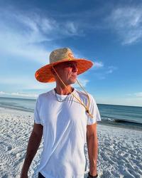 Kenny Chesney on a beach