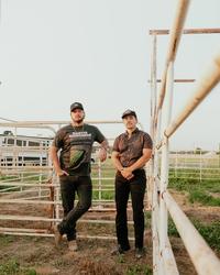 Muscadine Bloodline stood in-between fences