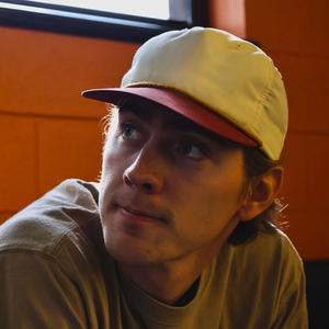 Dylan Gossett wearing a cap 