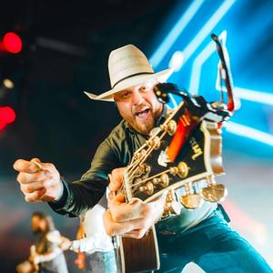 Cody Johnson looking down the camera lens