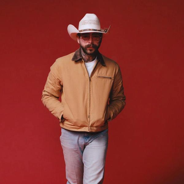 Post Malone wearing a workwear jacket