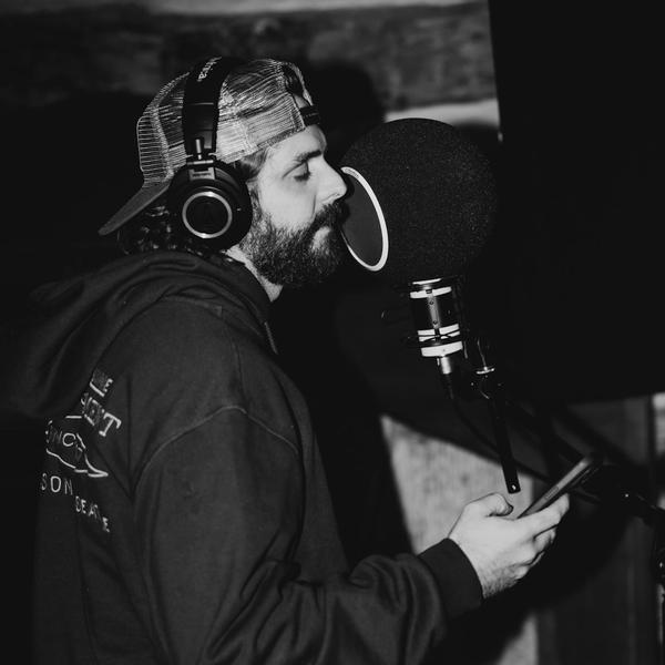 Thomas Rhett recording in black and white