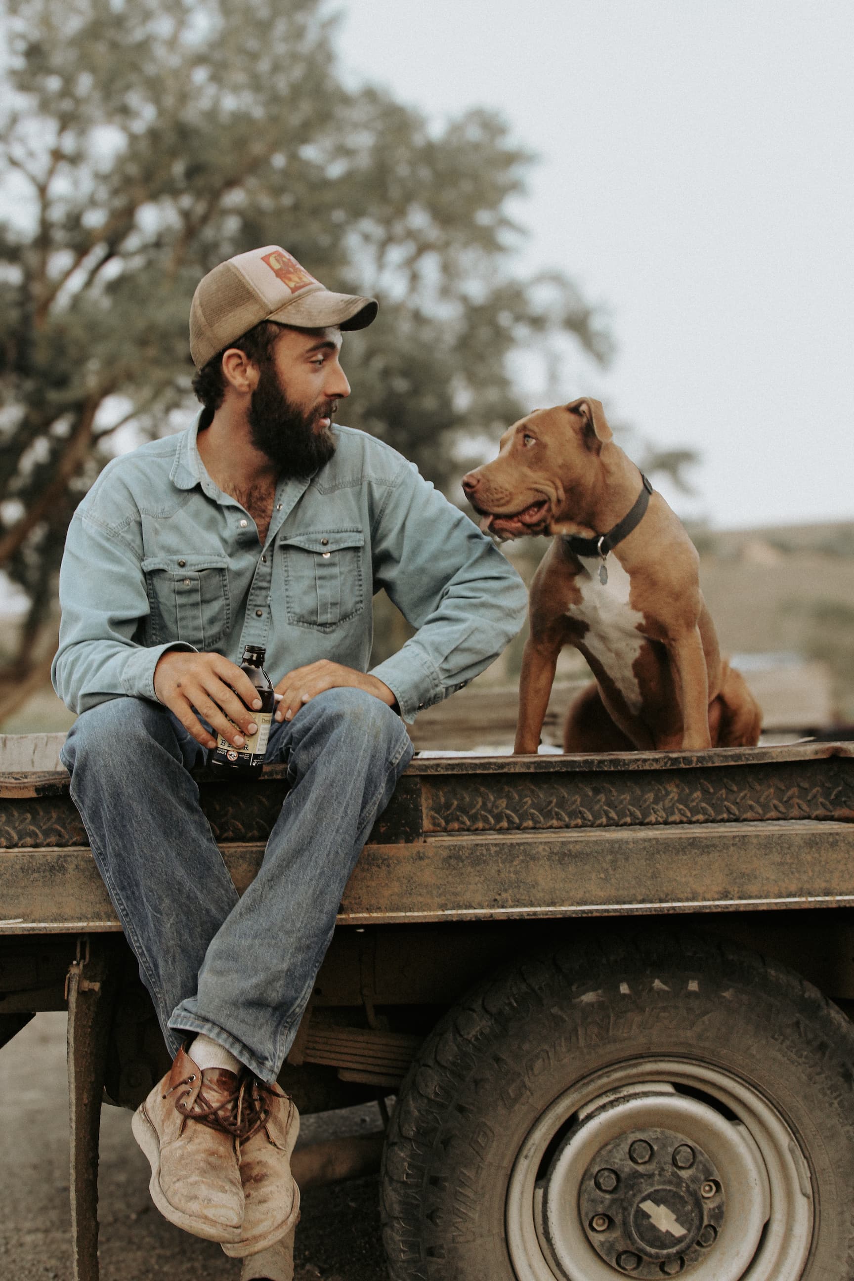 <p>Luke Bell with his dog, taken by Mike Vanata</p>