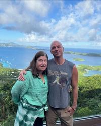 Kenny Chesney hugging Holly Gleason