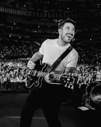 Marcus Mumford performing 2026