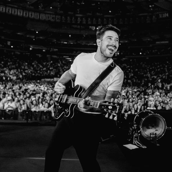 Marcus Mumford performing 2026