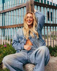 Ashley Cooke in a denim jacket