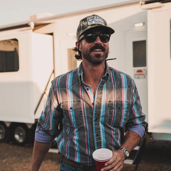 Riley Green backstage at a festival 2026