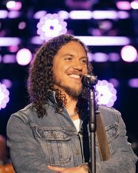 Brandon Lake smiling during a performance